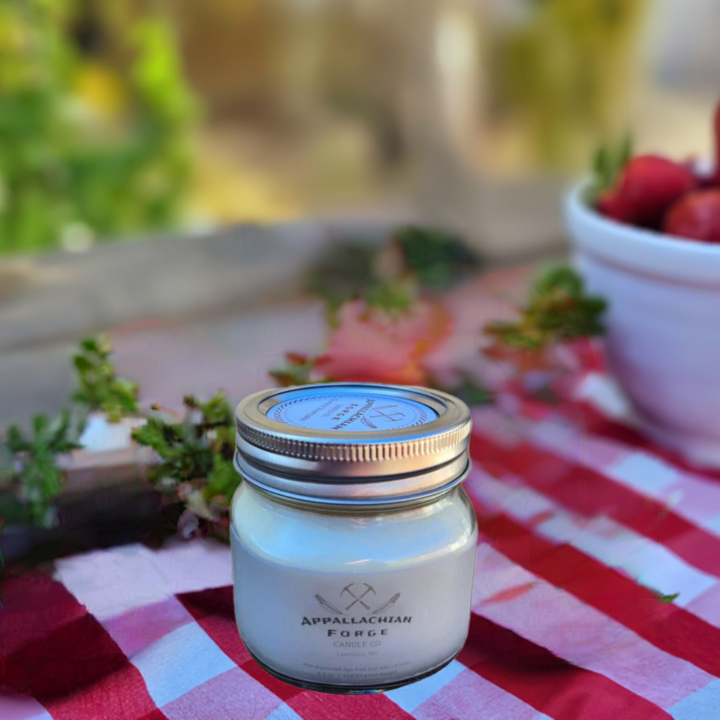Hand-poured dye-free soy wax candle in glass jar, eco-friendly and made in USA.